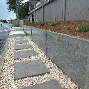 tuffpoly-sleepers-charcoal-retaining-wall-canal-sunshine-coast.webp